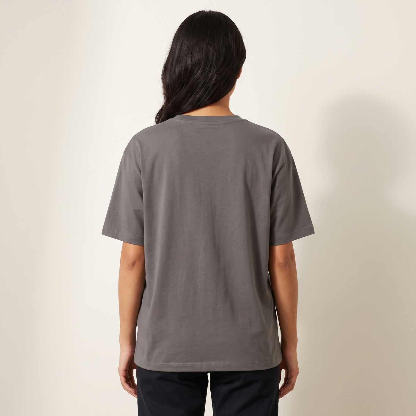 Boxy unisex fit on a size S, shown from the back