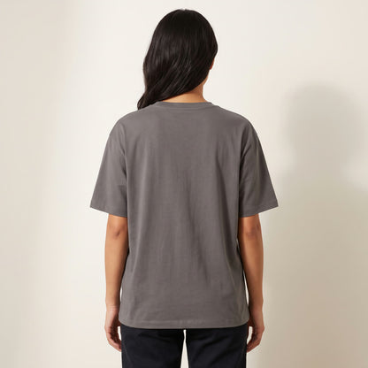 Boxy unisex fit on a size S, shown from the back