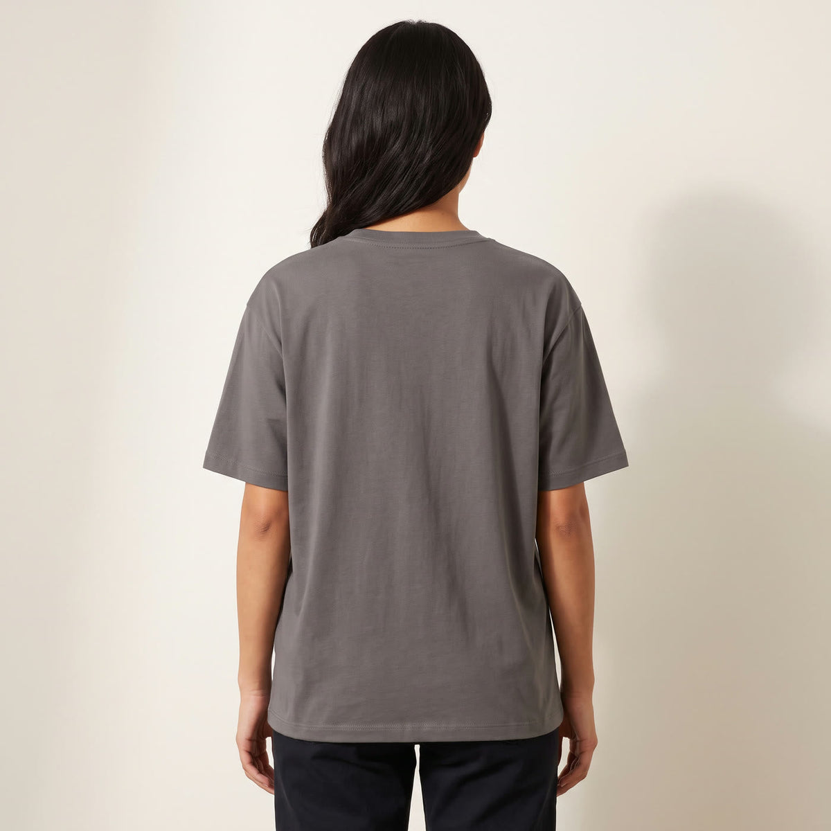 Boxy unisex fit on a size S, shown from the back