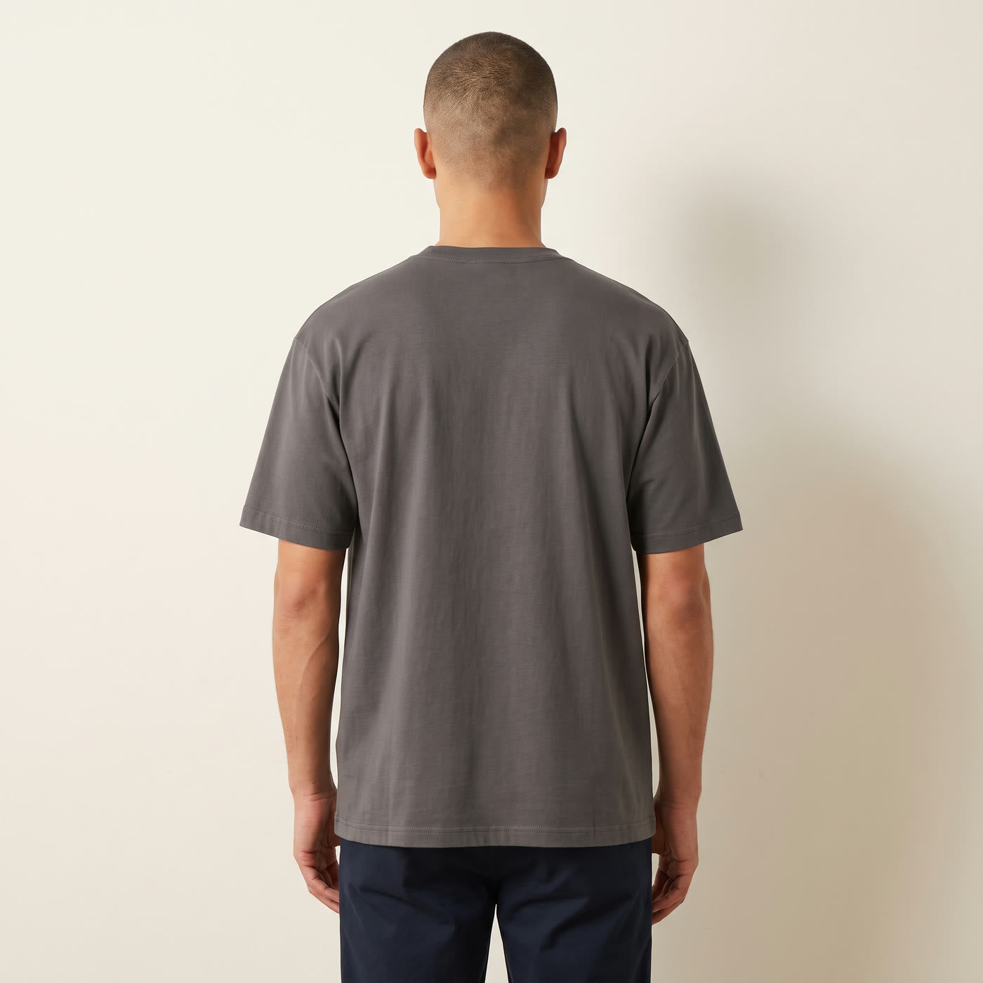 Boxy unisex fit, shown from the back